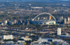 Aerial view of Wembley Stadium and its arch, surrounded by north-west London