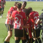 Brentford players celebrating at the Gtech Community Stadium