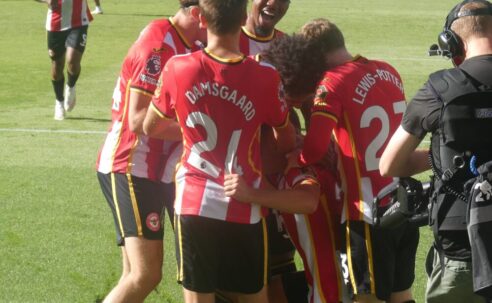 Brentford players celebrating at the Gtech Community Stadium